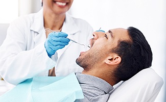 Patient receiving a dental checkup