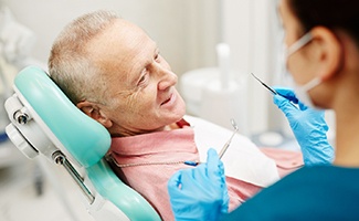 Older man visiting the dentist’s office