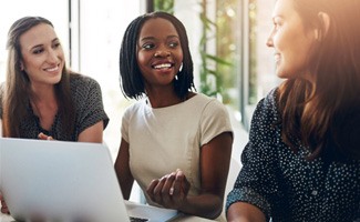 a business woman talking to colleagues