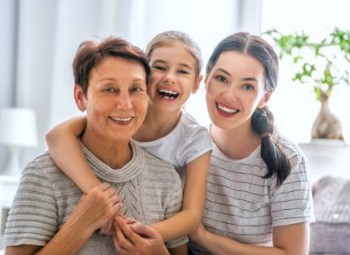 Smiling child mother and grandmother