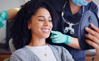 Woman smiling in the dentist’s chair