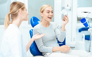 Young woman pleased with her smile results