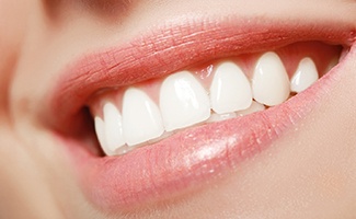 a close-up of a patient smiling