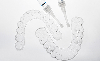 a close-up of a teeth whitening kit